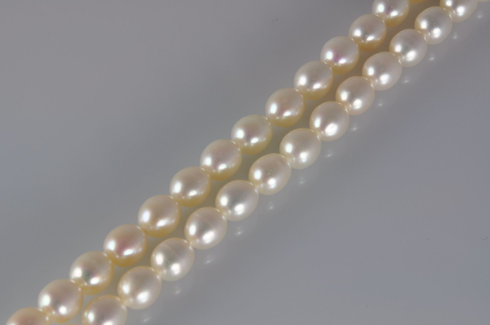 white oval freshwater pearls