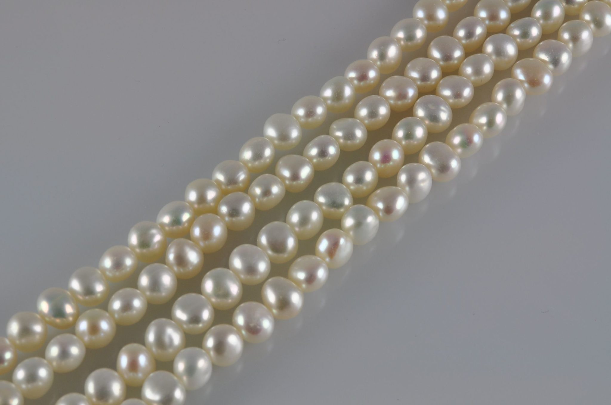 4.5-5mm BAROQUE white freshwater pearls