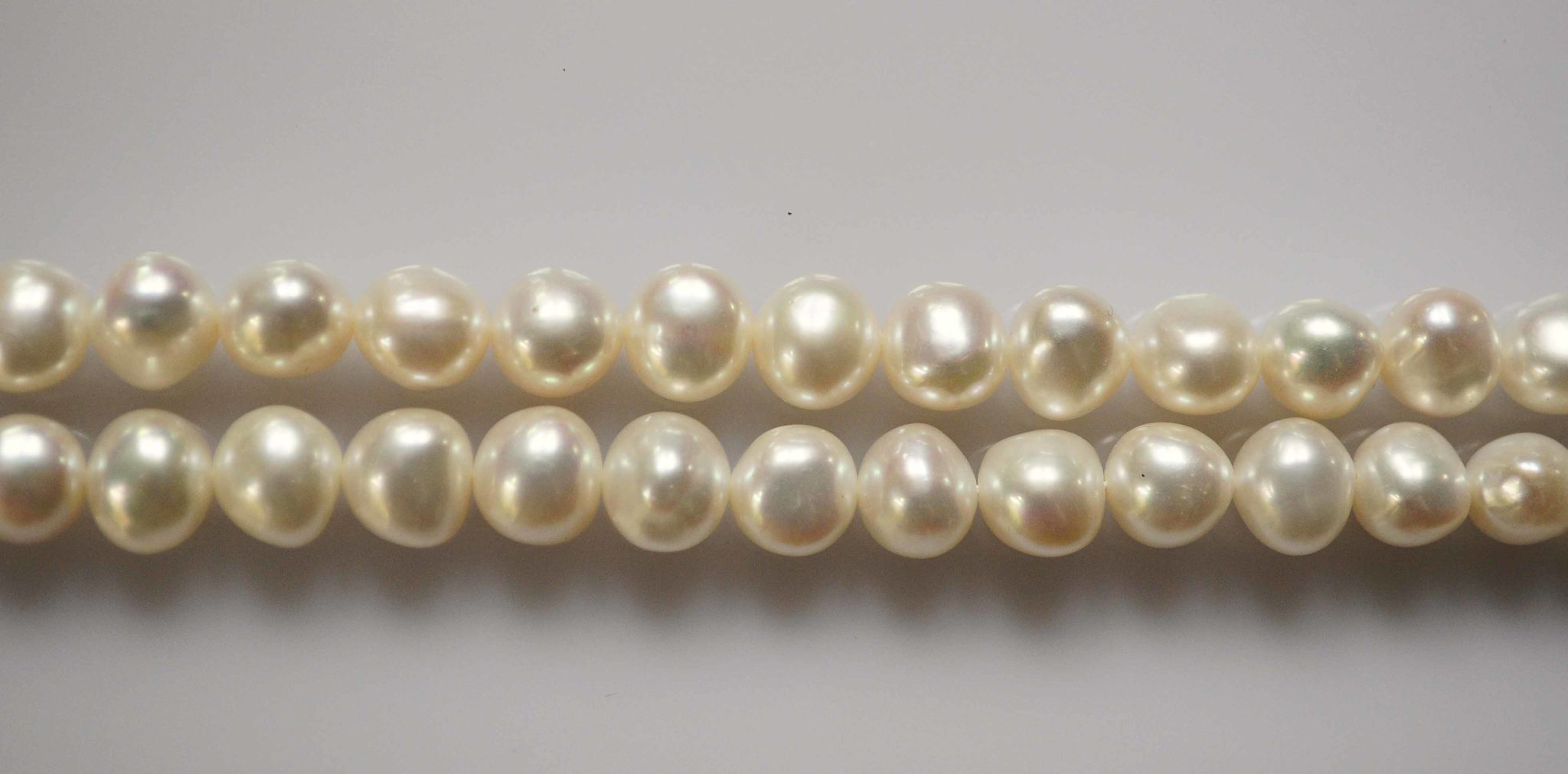WHITE BAROQUE FRESHWATER PEARLS 9-9.5MM